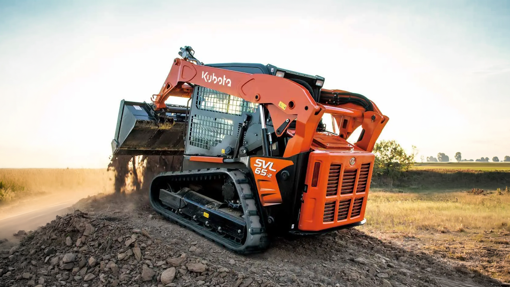 Kubota compact track loader on a dirt pile